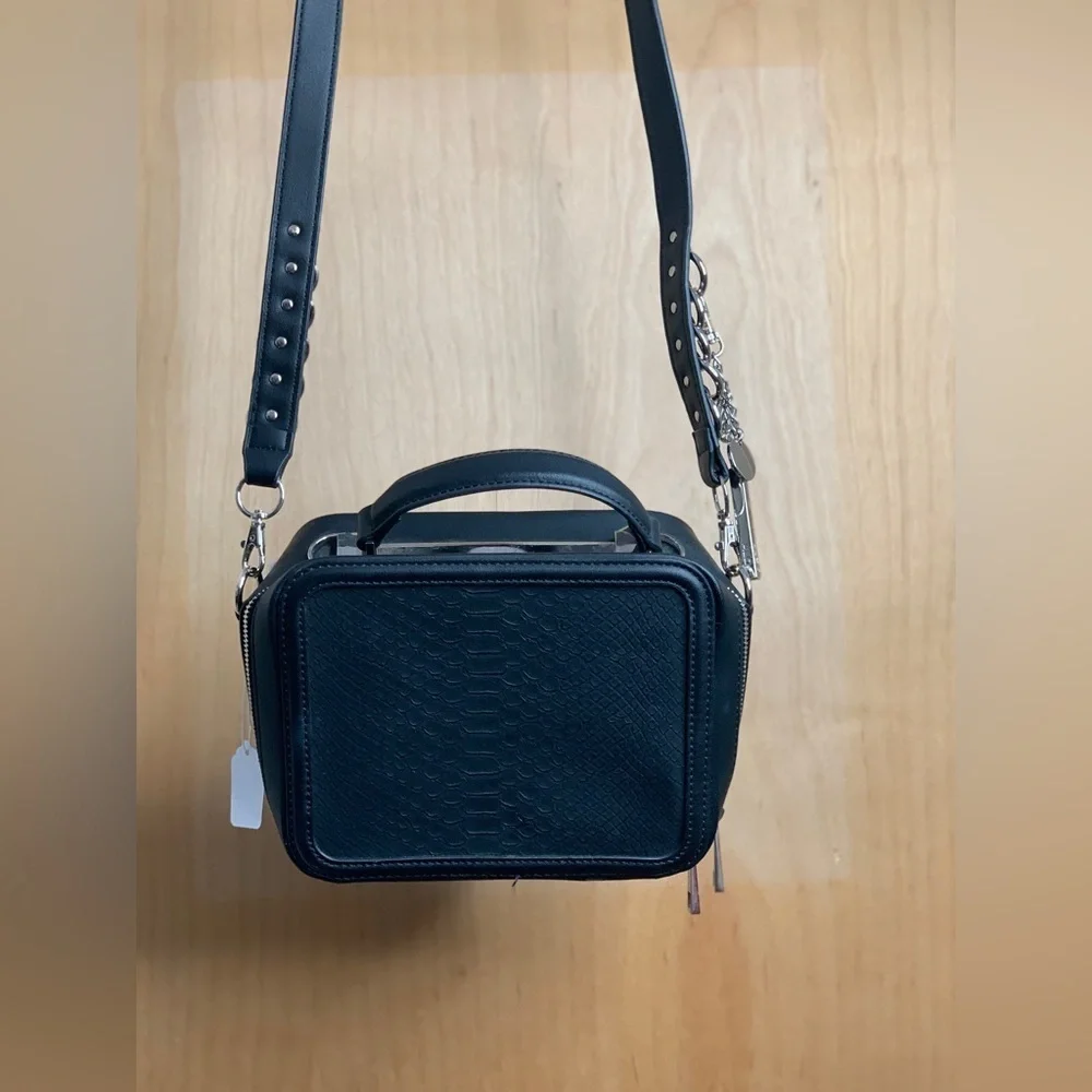 Aldo Black Faux Leather Crossbody Camera Bag.    Modern Hardware